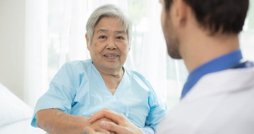 Older woman patient with her doctor