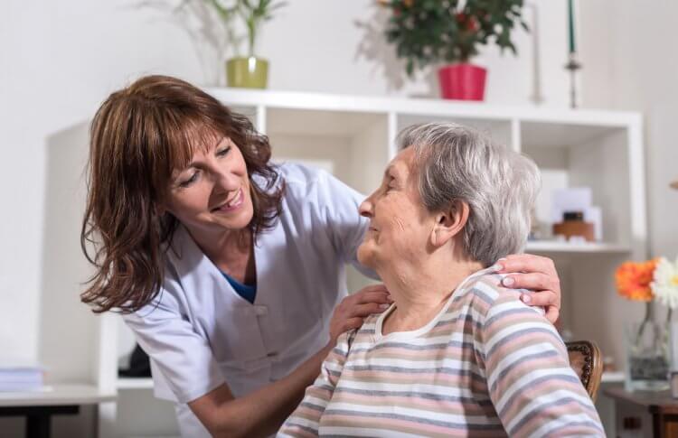 Nurse and Woman in long-term care