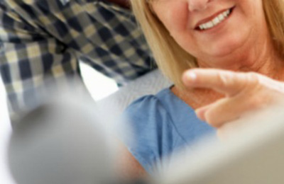 Woman skyping on tablet