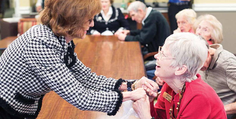 Molly Middleton Meyer working with residents of an assisted living center